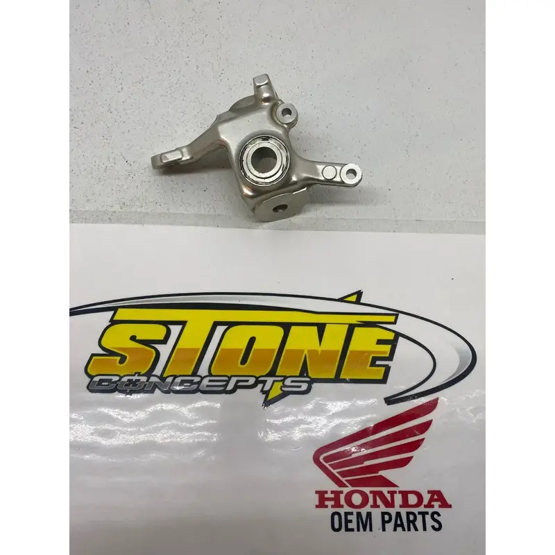 06-14 STOCK HONDA TRX450R FRONT RIGHT SPINDLE KNUCKLE TRX450ER TRX 450R 450ER