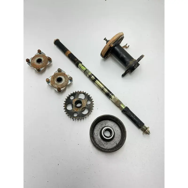 02 2002 Polaris Scrambler 90 2x4 2T OEM Rear Axle Hubs Brake Bracket Carrier